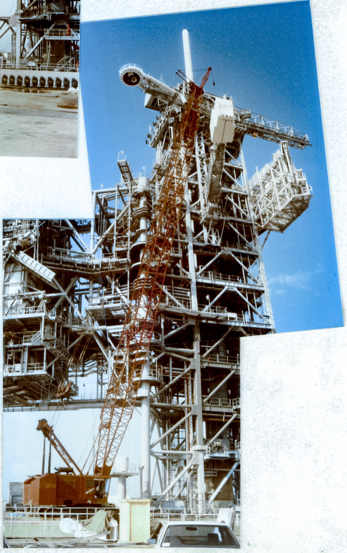 In this view, you can see that the Orbiter Access Arm has been lifted all the way up to its final elevation, between the 200' and 220' framing steel levels on the FSS, and now the ticklish work of maneuvering an object that weighs over 50,000 pounds up against the steel that will support it, to within less than a centimeter of allowable error, in a way that causes it to come in contact with its support steel softly, safely, and without causing any damage. This is virtuoso work, orchestrated perfectly by the crane operator and ironworkers, all of whom perform at world-class level in the pursuance of their respective crafts.